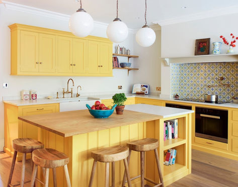 The Dopamine decor trend is all about bringing joy to a home, which is something we can definitely get on board with! This uplifting, sunshine yellow kitchen by award winning interior design and architectural consultancy @howarkdesign features our Ionian mixer with Rinse, Ionian Mini Instant Hot Tap and Pot Filler all in aged brass as well as a @ShawsofDarwen Shaker double sink Yellow Kitchen Inspiration, Family Home Interior Design, Family Home Interior, Yellow Kitchen Designs, London Family, Boutique Interior Design, London Home, Yellow Kitchen, Boutique Interior