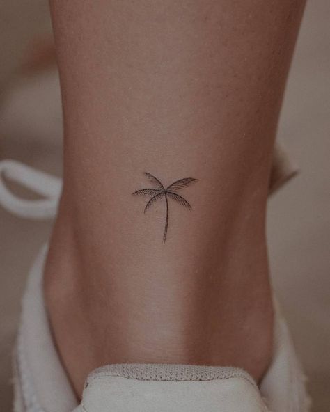 Fine line palm tree tattoo located on the achilles. 3 Palm Trees Tattoo, Tiny Tattoos Palm Tree, Fine Palm Tree Tattoo, Small Tattoos That Go Together, Small Tattoo Palm Tree, Unique Palm Tree Tattoo, Palms Tattoo Ideas, Palm Tree Turtle Tattoo, Delicate Palm Tree Tattoo