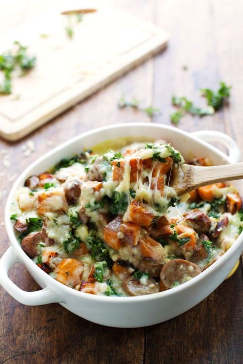 Sweet Potato, Kale, and Sausage Bake with White Cheese Sauce - comfort food featuring a handful of pantry staples and a few super healthy ingredients. Try it today for breakfast, lunch, or dinner! | pinchofyum.com Kale And Sausage, White Cheese Sauce, Pinch Of Yum, Sweet Potato Kale, Sausage Bake, White Cheese, Weekly Menu, Cheese Sauce, Main Meals