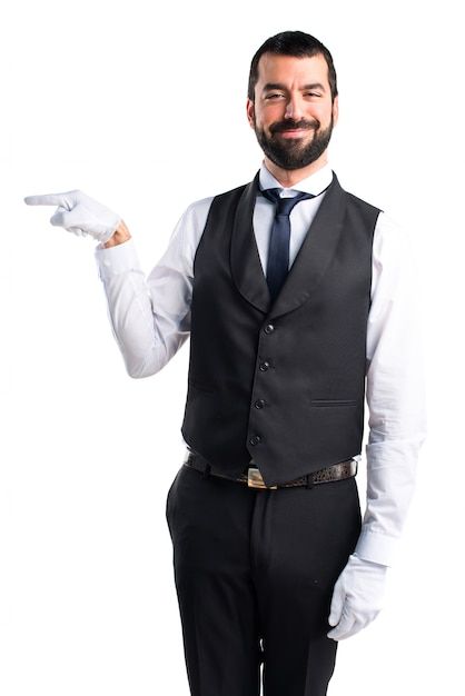 Free photo luxury waiter pointing to the... | Free Photo #Freepik #freephoto #butler #hotel-staff #waiter #businessman-pointing Hotel Staff, Vector Photo, Free Photo, Business Man, Free Photos, Free Stock Photos, Stock Images, Stock Photos, Hotel