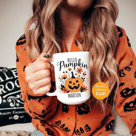 Hello Pumpkin! This personalized fall coffee mug is ideal for anyone who loves the autumn season. It's a fantastic gift for Halloween, fall birthdays, or any special occasion during the harvest season. Surprise your friends and family with a mug that is both functional and festive, perfect for their pumpkin spice lattes or hot cocoa! * ABOUT THIS MUG - We have 2 mug sizes and styles available. Please see the product photos for more information on mug choices! - Each mug is printed with with high Cute Halloween Gifts, Pumpkin And Flowers, Fall Coffee Mug, Mug With Name, Fall Mug, Halloween Traditions, Pumpkin Coffee, Hello Pumpkin, Fall Coffee