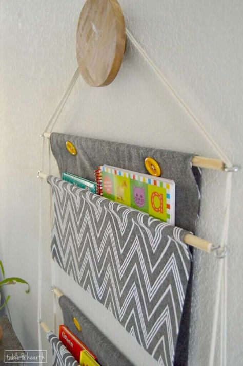 Fabric Bookshelf, Storage Children, Book Storage Ideas, Book Sling, Hanging Closet Storage, Small Space Storage Solutions, Hanging Bookshelves, Kids Book Storage, Wand Organizer