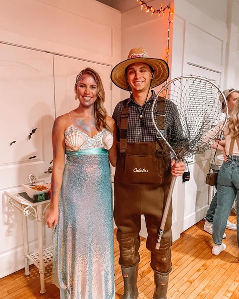 Mermaid and Fisherman. I got everything from Joanns and Hobby Lobby. I used a lace bralette and a hot glue gun for the top and safety pins for the skirt Fisherman And Mermaid Costume, Mermaid And Fisherman Costume, Fisherman Costume, Fishing Couples, Mermaid Halloween Costumes, Mermaid Halloween, Mermaid Costume, Halloween Looks, Couple Halloween