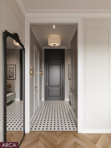 A modern classic hallway with black and white checkered top cer tiles, a parquet floor in light wood, a large mirror on the wall, a gray door at one end of the room, white walls with trim around the doors, and ceiling lights above the entrance to the corridor. Apartment in Saint-Petersburg Hallway Checkered Floor, Tiles Floor Entrance, Black And White Floor Tiles Hallway, White Walls With Trim, Black Door And Trim, Tiled Entrance Hall, Tiled Corridor, Walls With Trim, Room Corridor Ideas