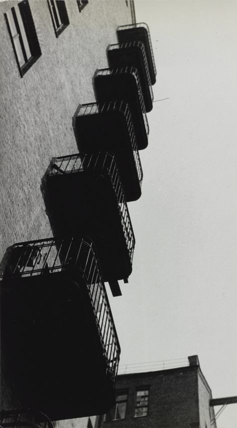 Alexander Mikhailovich Rodchenko 1891-1956 BALCONIES ferrotyped, titled in Cyrillic, dated '1925' and '1927,' and with numerical notations, possibly by the photographer’s daughter, Varvara Rodchenko, in pencil and with her collection stamp on the reverse, 1925, printed later (MoMA, Rodchenko, pl. 226; Levrantiev, p. 114) 11 1/2  by 6 3/8  in. (29.2 by 16.2 cm.) Aleksandr Rodchenko, Alexander Rodchenko, Russian Constructivism, A Level Photography, Structure Architecture, Urban Environment, Built Environment, Urban Photography, Urban Landscape