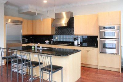 A Kitchen From The 2000s Is Remodeled | domino Updating Early 2000s Home, 2000s Kitchen Aesthetic, Early 2000s Kitchen, 2000s Kitchen, Home Gym Design Garage, 00s Style, Brick Decor, Modern Kitchen Cabinets, Design School