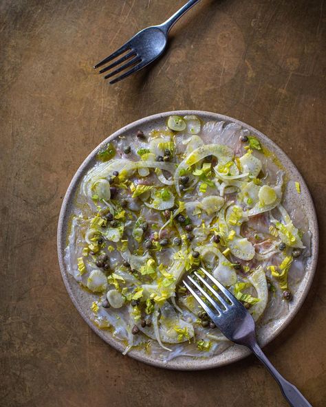 Gold, Notting Hill on Instagram: “New spin on a favourite dish: sea bass carpaccio, bergamot, fennel, celery heart, lilliput capers, chilli . #GoldNottingHill” Sea Bass Carpaccio, Sea Bass, Notting Hill, Fennel, Celery, Olive Oil, Seafood, Bass, Tableware