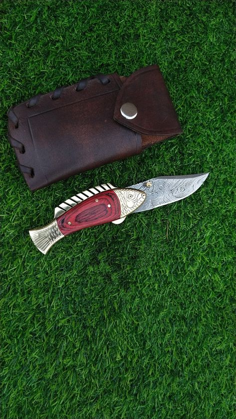 Custom Handmade Fish Folding Knife, Pocket knife, Best gift knife, Christmas gift knife, Wedding gift knife, Anniversary gift knife   Guarantee: We offer you a peace of mind and satisfying service. Quality assurance and customer satisfaction is our priority above everything. In any case if you are not satisfied with the products you can return them within 7 working days with absolute money back guarantee on receiving the product back in original condition. Courier / Shipping: Through DHL and DPD, fast and traceable. Payment is done according to the weight to Courier Company for all sorts of deliveries. So, the best discount is offered to you for shipping when you buy more than one product. Customer care: Our products are extremely sharp please use responsibly and always keep away from chil