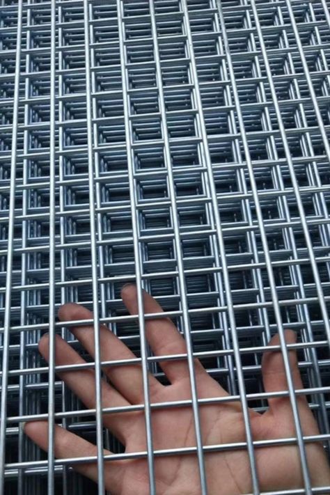 Welded Wire Mesh can be divided into welded mesh rolls and welded wire mesh panels. The welded wire mesh rolls are widely used for garden fencing, plaster mesh. Welded Wire Mesh panel has thicker wire diameter and larger opening sizes for high security applications, such as prison fencing, factory fencing and other site security fencing. Wire Mesh Fence Ideas, Mesh Fence Ideas, Wire Fence Ideas, Wire Fence Panels, Metal Mesh Screen, Security Fencing, Welded Wire Fence, Deck Remodel, Metal Fence Panels