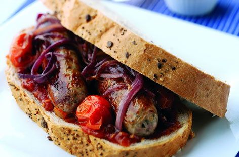 Sausage & caramelised onion sandwich recipe Onion Sandwich Recipe, Caramelized Onion Sandwich, Onion Sandwich, Caramelised Onion, Sausage Sandwiches, Tomato Relish, Tesco Real Food, Sandwich Fillings, Deli Food