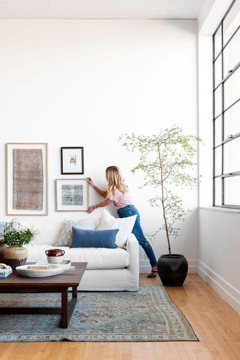 Our foolproof tips for the #1 design mistake we see: hanging art incorrectly. #art #homedecor #wallart Studio Mcgee Living Room Coffee Tables, Studio Mcgee Art, Studio Mcgee Office, Studio Mcgee Living Room, Studio Mcgee Home, Studio Mcgee Kitchen, Mcgee And Co, Mcgee Home, Hang Art