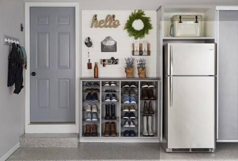 There's a good chance your busy family goes in and out of this door multiple times a day. All the more reason to make the space around it as welcoming - and organized - as can be. A space-saving Inspired Closets Shoe Shrine is a great place to start. 🏃‍♀️👢 - garage design - garage storage ideas - garage organization - garage storage - garage ideas - garage organization ideas - shoe organization - shoe storage - vermont home interiors - vermont home decor - vermont home plans - #vermont #garage Inspired Closets, Mud Room Garage, Garage Entryway, Garage Storage Inspiration, Garage Organisation, Garage Laundry, Garage Renovation, Garage Remodel, Garage Interior