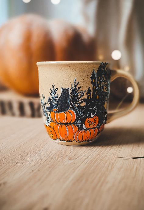 Pumpkin mug barrel-shaped witch black cat and witch hat. Spider web around The mug is perfect for fall and Halloween coffee and tea Measurements: Height 9,5 cm / 3,7 inch About 380 ml / 12,8 oz Perfect gift for: - For people who wanna seek magic every day. - People who love wild nature and love to drink herbal tea. - Magic lovers and witchcraft. - For people, witch love the forest. The mug is well protected during shipping. Each mug is packed very nicely for a gift, as shown in the photos. You c Coffee Mug Ideas, Mug Ideas Pottery, Witch Gifts, Fall Mug Ideas, Fall Mug, Witchy Gifts, Fall Mugs, Halloween Mug Ideas, Halloween Pottery Ideas