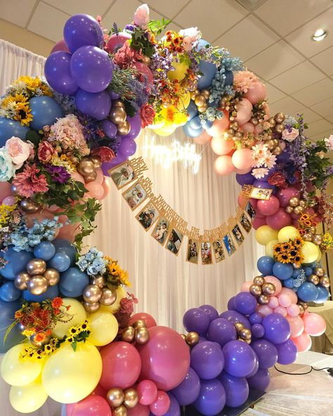 *wildflower themed balloon garland* Hire us for professional balloon decor that elevates your event! #eventmanagement #balloons #balloongarland #wildflowertheme #birthdayparty #dallasevents #eventdesign #backdropdesign #backdrop #flowerarrangement #balloondecoration #eventplanning #birthday Wildflower Balloon Backdrop, Wildflower Balloon Garland, Flower Balloon Backdrop, Land Of Flowers, Themed Balloon Garland, Flowers Balloons, Balloon Backdrop, Balloon Flowers, Balloon Decor