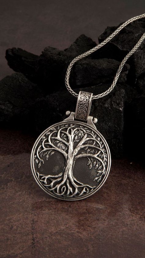 This 925 Sterling Silver necklace, with an aged finish, features stylish engraving details. Expertly made and intricately designed, SilverGates jewelry collection is presented in an array of contemporary and classic pieces. Made with carefully selected materials ★Item Details • Material: 925 Sterling Silver • Pendant weight: 13-14 grams • Bail Width : Suitable for up to 0.15 Inc (4.00 mm) Chain • Pendant Diameter: 3.5 cm x 3.5 cm • Chain Thickness: 1.5 mm Mens Cross Chain, Yggdrasil Necklace, Viking Man, Man Jewelry, Viking Men, Mens Crosses, Cross Chain, Tree Necklace, Men Jewelry