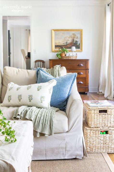 Transitional French Living Room, Living Room With Three Doors, Grandmillenial Throw Pillows, Block Print Pillows Living Room, Blue And Cream Room Aesthetic, Green Living Room Pillows, Cozy Living Rooms Cottage, Beige Sofa Living Room Ideas Decor, Cream And Blue Living Room