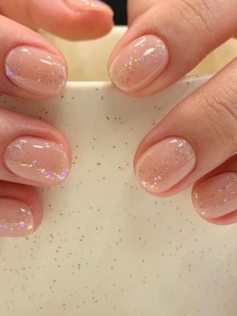 22 Delicate Glitter Nails to Add a Touch of Sparkle | The KA Edit Korea Nails Design Simple, New Years Eve Nails Ideas Classy Short, New Years Short Nails, Trending Gel Nails, Clear Glitter Nails, Silver Nail Designs, New Years Eve Nails, Silver Nail, Subtle Nails