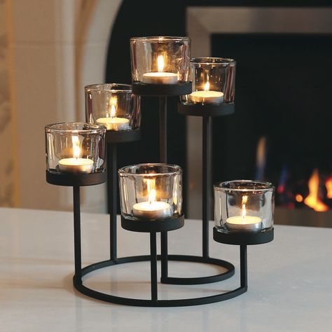 I've just found Spiral Tealight Holder. A stunning six tier tealight candle holder. £19.95 Stick Decor, Glass Tealight Candle Holders, Tea Candle Holders, Glass Tea Light Holders, Diy Candle Holders, Wedding Lanterns, Buy Candles, Light Candles, Tea Candles