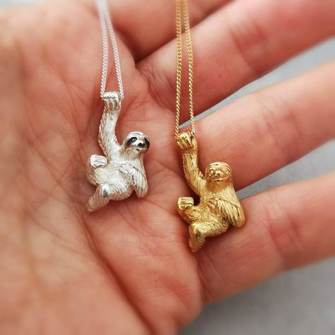 "Check out these two! 😍 Our brand new #sloth pendant is available in sterling silver (with black stripes across the eyes) or 9ct gold. Handmade to order in our UK workshop ❤️\n#sloth #necklace #slothsnecklace #love #sloths" Sloth Necklace, Sloth Jewelry, Cat Necklace Silver, Caged Necklace, Lovers Necklace, Sterling Silver Cat, Bear Necklace, Cat Jewelry, Bird Jewelry