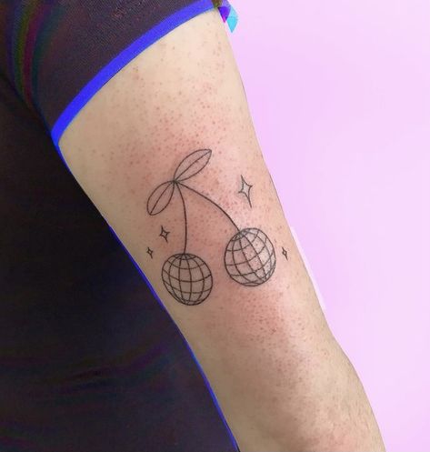 Artist insta is @charlottelucyy_tattoo check them out!!! #tattoo #tattooideas #tattoo #simpletattoo #cutetattoo #tattooideas #tattoodesign #dogtattoo #flowertattoos #charlottelucyy #charlottelucyytattoos #handpoketattoos #handpoke #ukartist #uk Cherry Mirrorball Tattoo, Cherry Harry Styles Tattoo, Harry Styles Cherry Tattoo, Disco Cherry Tattoo, Disco Ball Cherry Tattoo, Cherry Disco Ball Tattoo, Out Line Tattoo, 80s Tattoo Ideas, Small Quirky Tattoos