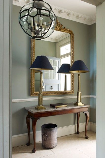 Discover stylish new hallway design ideas, including this one were a tablea has been created with a console table And Mirror Grey Hallway Ideas, Grey Hallway, Wainscoting Bedroom, Holland House, Dark Hallway, Hallway Mirror, Hallway Inspiration, Entrance Table, Hallway Designs