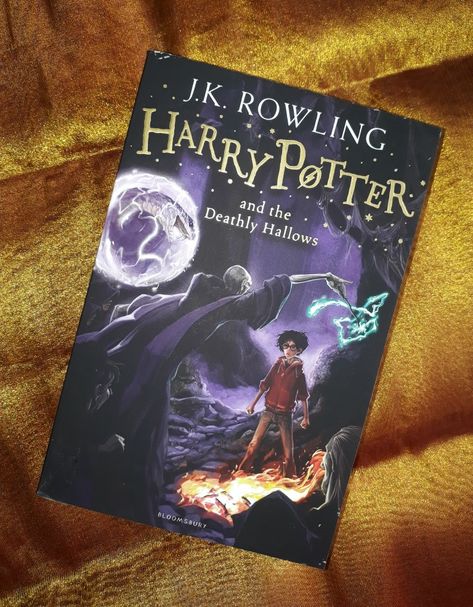 Harry Potter and the Deathly Hallows by J.K. Rowling. Burdened with the dark, dangerous, and seemingly impossible task of locating and destroying Voldemort's remaining horcruxes, Harry, feeling alone and uncertain about his future, struggles to find the inner strength he needs to follow the path set out before him. Harry Potter And The Deathly Hallows Book, Harry Pptter, Deathly Hallows Book, Hollow Book, Rowling Harry Potter, Harry Potter Deathly Hallows, The Deathly Hallows, Hogwarts Aesthetic, J K Rowling