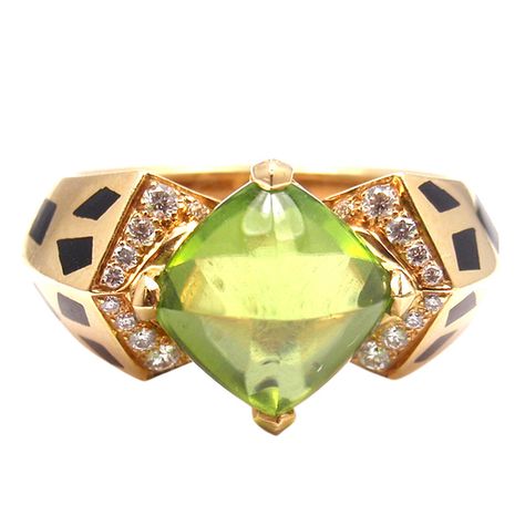 CARTIER Paris Diamond Peridot Panther Spot Gold Ring | From a unique collection of vintage cocktail rings at http://www.1stdibs.com/jewelry/rings/cocktail-rings/ Vintage Cocktail Ring, Cartier Panthere, Peridot Jewelry, Jewelry Post, Jewels Rings, Cartier Jewelry, Black Lacquer, Peridot Ring, Cocktail Ring