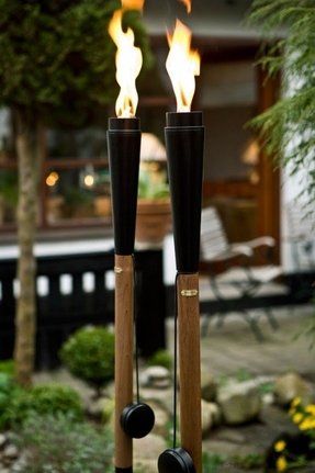 Outdoor Oil Torches - Ideas on Foter Juice Counter, Wine Bottle Tiki, Wine Bottle Tiki Torch, Garden Torch, Blue Wine Bottles, Outdoor Torches, Outdoor Candle Holders, Round Paper Lanterns, Outdoor Table Tops