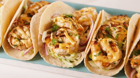 Cilantro Lime Shrimp Tacos — Delish.com Lime Shrimp Tacos, Cilantro Lime Shrimp Tacos, Cilantro Shrimp, Grilled Shrimp Tacos, Shrimp Taco, Shrimp Taco Recipes, Cilantro Lime Shrimp, Lime Shrimp, Recipes Seafood