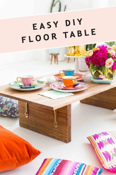 This DIY low floor table is so fun and perfect for floor seating! Make it yourself with our easy step by step tutorial and you can have a new table option for your next gathering. Surround it with comfy pillows and you have a great, boho-inspired option for your dinner parties. You can also take it outdoors for a picnic or backyard barbecue!  #diy #table #lowtable #floorseating #wood #simple #homedecor #diydecor Diy Floor Table, Diy Table Decor, Dekor Diy, Comfy Pillows, Diy Home Decor Ideas, Floor Table, Floor Seating, Diy Flooring, Entertaining Ideas