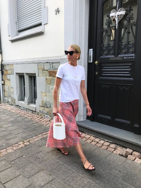 White tee and Ganni skirt... #ganni #ganniskirt #stylist #styleblogger #fashionstylist #modeblogger #whitetee #staud #streetstyle #streetfashion #fashiontrends #sandals Ganni Street Style, Blue Midi Skirt, Flats Outfit, Slingback Flats, Pink Skirt, Fashion Stylist, Midi Skirt, Fashion Blogger, Summer Fashion