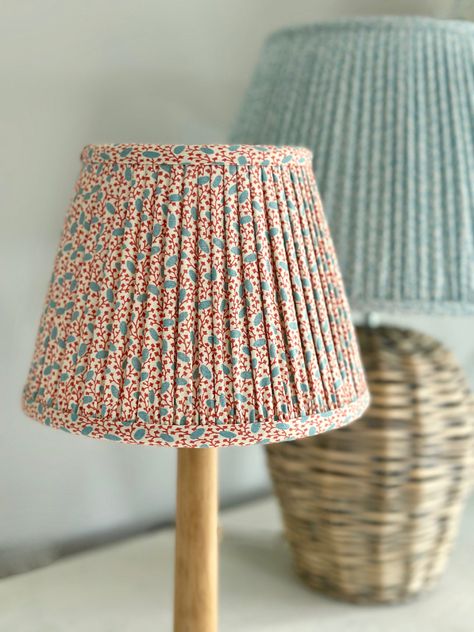 Classic empire shape lampshade, hand pleated and gathered in 100% cotton fabric. Enlarged from a tiny fragment of 19th Century patchwork, Pinto has a modern twist. Measurements listed top, bottom, side