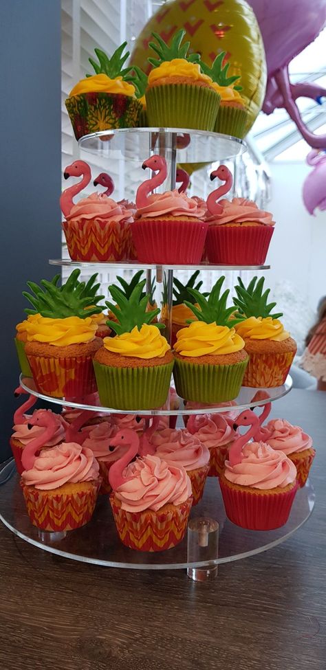 Tropical Party Treats, Luau Cupcakes Ideas, Tropical Pool Birthday Party, Flamingo Pineapple Cake, Flamingo Pineapple Birthday Cake, Tropical Party Cupcakes, Luau Theme Cupcakes, Hawaiian Party Cupcakes, Tropical Pool Party Food