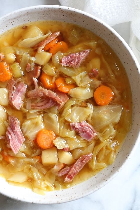 If you're making a big bone-in ham for the holidays this year, don’t throw away the leftover ham bone once all the meat’s been cut off. It’s a key ingredient in this soup that adds instant flavor with minimal effort! Here I added some vegetables, potatoes and cabbage, there are no beans but you can add some if you wish. So delicious and easy to make! Leftover Ham Bone Soup, Bone Recipes, Ham Bone Recipes, Leftover Ham Bone, Cabbage Soup Diet Plan, Ham And Cabbage Soup, Soup With Potatoes, Ham And Cabbage, Ham Bone Soup