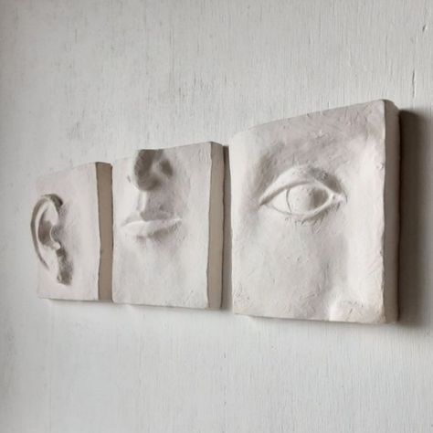 Is it ok that I want faces hanging off my walls? A sculptural piece instantly adds dimension, texture and whimsy to a space. The handmade, artisanal nature of ceramic faces offers a sense of individuality and craftsmanship, pushing you to find a piece that matches your personality. 🥸 #CozyHome #HomeDecorTrends #InteriorDesign2025 #ModernInteriorDesign #HomeStyling #ModernHome #CozyHome #HomeDesignIdeas #ceramicsculpture Sculpted Wall Art, Wall Clay Art, Relief Sculpture Clay, Bas Relief Sculpture Wall Art, Clay Relief Sculpture, Dry Wall Art, Detail Wall, Relief Ceramic, Art Triptych