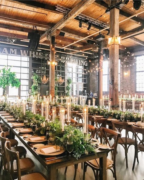 Persephone on Instagram: “Brewery wedding made rustic chic 🌿 Romantic lighting and greenery really go a long way to make an industrial space warm and cozy //…” Brown Centerpieces, Brown Green Wedding, Taper Candle Centerpiece, Boone Hall Wedding, Taper Candles Wedding, Garland Centerpiece, Wedding Brown, Holding Bouquet, Handmade Wedding Bouquet