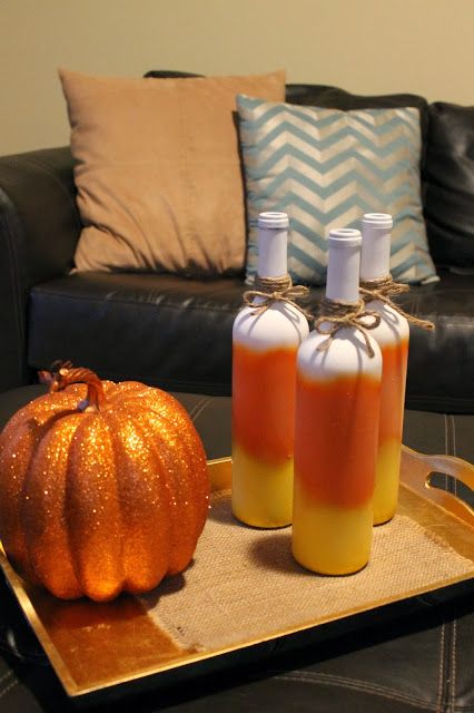 Candy Corn Painted Wine Bottles #diy #halloween #spraypaint #falldecor Pumpkin Wine Bottles, Candy Corn Bottle Flip, Fall Decor Wine Bottles, Wine Bottle Fall Decor Diy Projects, Candy Corn Painted Wine Bottles, Fall Wine Bottles, Corn Painting, Wine Bottle Crafts Christmas, Diy Instruments