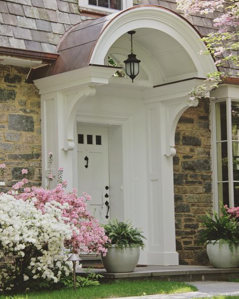 Sneak peek! A portico with traditional trim details and a charming curved copper roof adds curb appeal to this Chevy Chase Dutch colonial 🏡… Colonial Curb Appeal, Dutch Colonial Exterior, Portico Entry, Portico Design, Dutch Colonial Homes, Gros Morne, Colonial House Exteriors, White Exterior Houses, Colonial Exterior