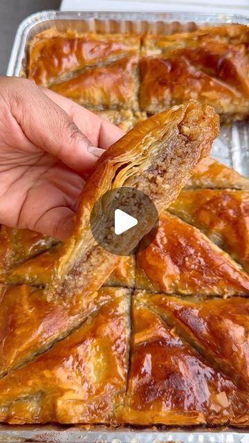 Shelina Permalloo on Instagram: "Walnut Cinnamon Baklava! The easiest baklava recipe! This is NOT authentic but it is EASY!! No layering of butter and brushing one layer at a time so this is the lazy version and it came out super crispy and trust me when I say, you’ll also be doing the happy dance in your kitchen when these are cooked! X1 packet baklava pastry (I use Melis Baklavalik Yufka Filo Pastry) 250g butter melted 500g walnuts - popped in the food processor until you get a crumbly mixture 1tsp cinnamon powder Sugar syrup 250g unrefined golden caster sugar Juice of half lemon and one slice of lemon 1 cinnamon stick 500ml water Sugar syrup: - Cook on high heat for 10-15 minutes until the mixture is reduced by 1/2 For the baklava I used a disposable foil tray 30cmx20cm- Place one ha Lazy Baklava, Baklava Recipe Easy, Phyllo Recipes, Baklava Recipe, Filo Pastry, Powder Sugar, Sugar Syrup, Cinnamon Powder, Caster Sugar