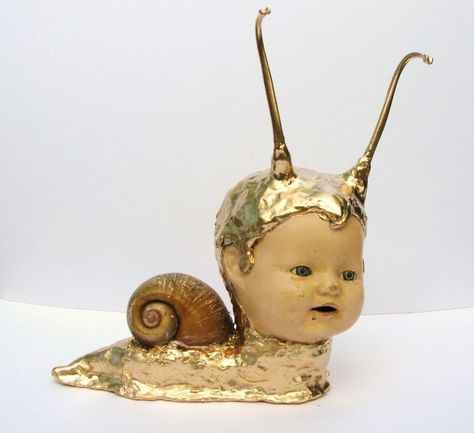 Giant Snail, Creepy Doll, Art Brut, Creepy Dolls, Assemblage Art, Doll Art, Doll Parts, Weird Art, Doll Head