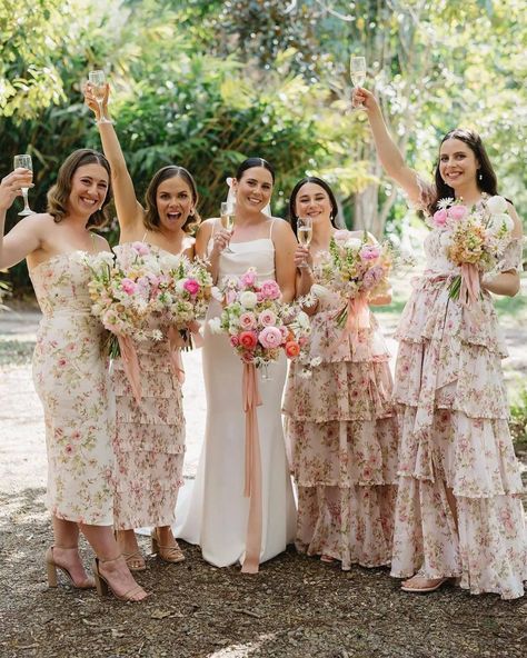 🌸 Floral bridesmaids dresses are so FAB 🌸 Watercolour, paisley, ditsy or bold, there are so many ways to work your florals! 🌼 💐 Click the link in our bio for 50+ beautiful bloom bridesmaids dresses: https://onefabday.com/floral-bridesmaids-dresses/ Photo 1: 👗 & 📸 by @vchapmanstudio Photo 2: 📸 by @davidabel.co Photo 3: 👗 by @maidstomeasure 📸 by @michellepruntyphotography Photo 4: 📸 by @jessaschifilliti Photo 5: 👗 by @staud.clothing, @acler, @revolve 📸 by @samanthariles.weddings Photo 6... Floral Bridesmaid Dresses Mismatched, Bridesmaid Dresses Floral Print, Matching Bridesmaids Dresses, Floral Bridesmaids, Printed Bridesmaid Dresses, Light Blue Bridesmaid Dresses, Floral Print Gowns, Princess Bridesmaid Dress, Gorgeous Bridesmaid Dresses