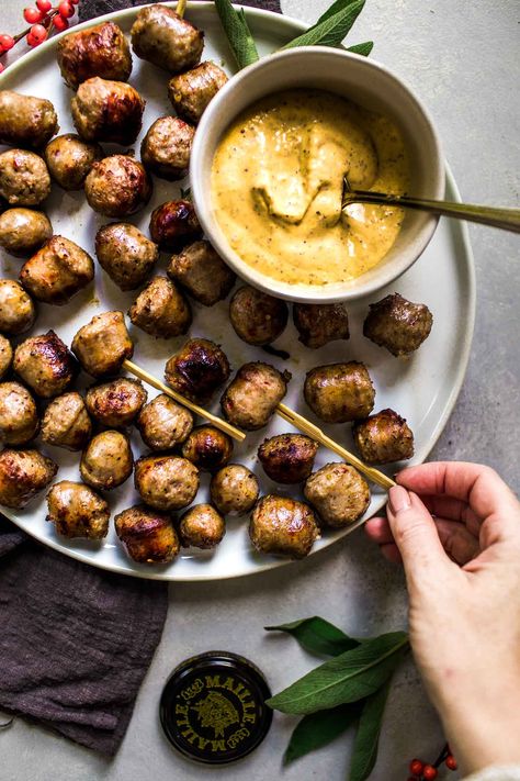 Sausage Bites Cooked in White Wine and Served with Creamy Mustard Dipping Sauce - #ad These Sausage Bites are simmered in white wine and served with a creamy, spicy mustard dipping sauce. They’re a delicious party appetizer that cooks up quickly. Sausage Bites, Party Nibbles, Yummy Appetizers Parties, Veggie Cups, Nibbles For Party, Mustard Dipping Sauce, Spicy Mustard, Dip Sauce, Best Appetizer Recipes