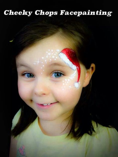 Santa Hat Face Paint, Simple Christmas Makeup Looks, Simple Christmas Makeup, Face Painting Images, Christmas Makeup Looks, Christmas Makeup Simple, Christmas Face Painting, Cheek Art, Girl Face Painting