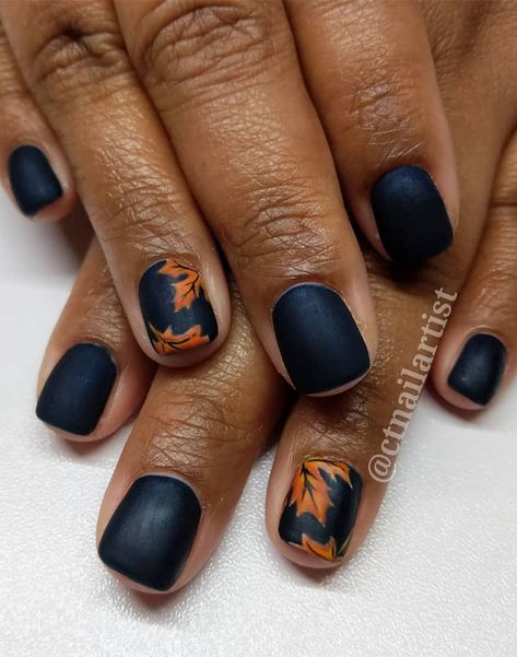 Navy blue nails Looking for stylish and easy to wear nail art? If so, this could be perfect for you. Gorgeous matte orange fall leaves... Black Nails With Fall Leaves, Glitter Leaves Nails, Brown And Navy Nails, Navy And Orange Nails Design, Navy Blue And Burnt Orange Nails, Navy Nails Fall, Navy Blue Matte Nails Fall, Blue Fall Nails 2022, Navy Autumn Nails