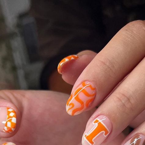 Taylei Williams Osborne on Instagram: "Timp View High football nails🏈 for the best wife who put orange (her least favorite color) on her nails to support her coaching hubby!🤗 they turned out dang cute!" Tennessee Volunteers Nails, Tennessee Football Nails, Tennessee Nails Volunteers, Tennessee Nails Designs, Football Season Nails, Tennessee Vols Nails, School Spirit Nails, Tennessee Nails, Football Nails