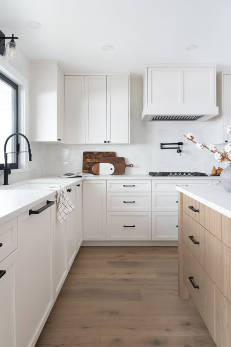 White Shaker Cabinets and a Wood Island with a White Top  The beauty of this kitchen lies in its simplicity and versatility! Mix Shaker And Flat Cabinets, Frameless Shaker Kitchen Cabinets, Axstad White Kitchen, White Shaker Door Kitchen, White Backsplash Kitchen White Cabinets, Full Overlay Cabinets Shaker Style, Mixing Flat Panel And Shaker Cabinets, White Shaker Kitchen Cabinets Modern, White Shaker Kitchen Cabinets Hardware