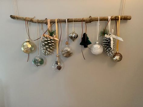 Winter | Christmas decorative wall or door bauble branch with gold, green, silver, white and brown.  A striking way to create a new look and add impact to any wall space this Christmas. 75cm branch included. Christmas Branch Decoration, Branch Christmas Decorations, Silver Gold Christmas Decorations, Branch Christmas Decor, Twig Decor, Christmas Decorations Wall, Eco Christmas Decorations, Tree Branch Ornaments, Xmas Collage