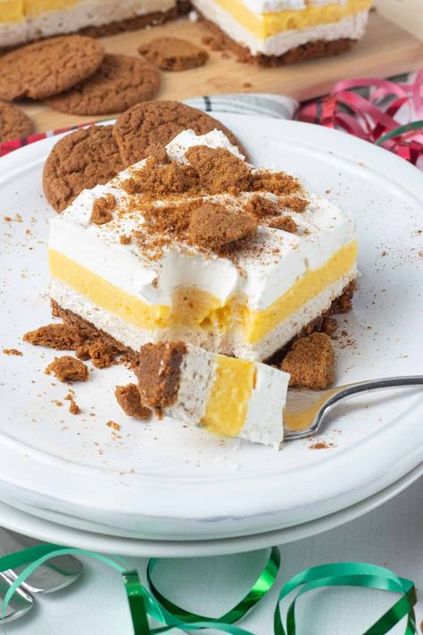 These No Bake Eggnog Dream Bars will be your new Christmas and New Year’s Eve dessert. Eggnog desserts are extremely popular, but this easy homemade eggnog bar is sure to go to the top of the list! With a gingersnap cookie crust, cinnamon cheesecake, vanilla eggnog pudding, and Cool Whip, you’ll enjoy the delicious spice flavor and layer combination in every bite. No Bake Eggnog Cheesecake, Eggnog Desserts, Spiced Cheesecake, Eggnog Pudding, Pudding And Cool Whip, Eggnog Dessert, Cinnamon Cheesecake, Eggnog Cheesecake, Dream Bars