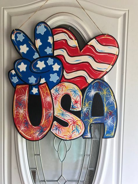 Dollar Tree 4th Of July Decor, Usa Door Hanger, Fourth Of July Wreath, Diy Popsicle Stick Crafts, Patriotic Door Hanger, Memorial Day Decorations, Initial Wreath, Creative Wreaths, Door Hangers Diy