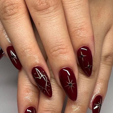 Shantal Saba on Instagram: "🍷✨ . . . .  #nails #nailsart #nailsdesign #nailinspo #nailideas #winternails #winternailart #christmasnails #christmasnailart #holidaynails #newyearsnails #chromenails #chromestarnails #darkrednails  #winerednails" Nails Inspiration For Christmas, Hadestown Nails, Dark Red Fall Nails Design, Red Celestial Nails, Christmas Nails Grunge, Saltburn Nails, Witchy Winter Nails, Red And Gold Holiday Nails, Red Witchy Nails